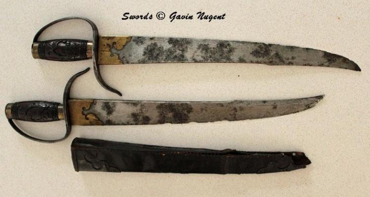 Another set of hudiedao from the private collection of Gavin Nugent.  These blades are some of the earliest seen in this post.  They also show signs of significant use.  Note the complex profile of the blades and how the spine flattens out as it approaches the tip.  This allows the weapon to have reach while not feeling "top heavy."  The owner notes that these are the most comfortable hudiedao that he has handled. Source: http://www.swordsantiqueweapons.com/