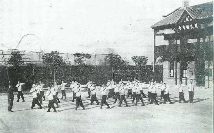 A typical Jingwu training class in front of the second Shanghai Headquarters of the group.  Note the emphasis on forms and line-drills.