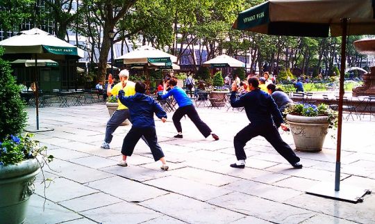 Morning Taiji group in Bryant Park, New York City.