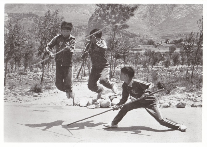 Three unidentified children practice Kung Fu near the Shaolin Temple. This photo was taken in 1982 and it captures the first moments of the "Golden Age" of Kung Fu in mainland China.