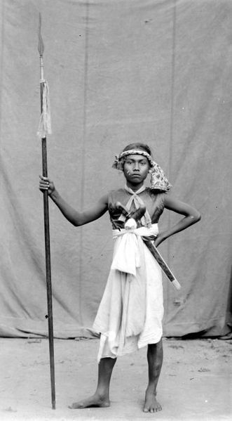 A 19th century warrior with traditional weapons.  Source: Wikimedia.