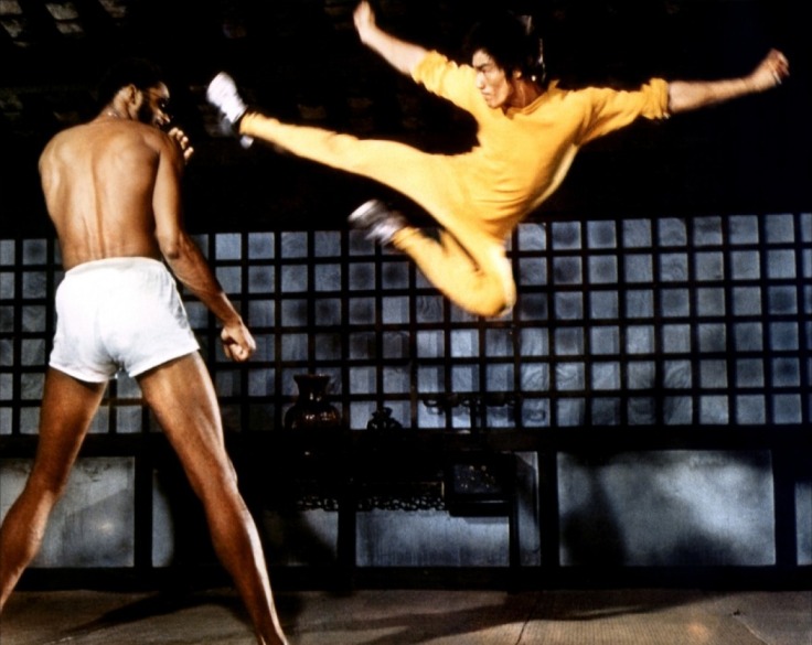 Bruce Lee executes a spectacular flying kick while filming "Game of Death."