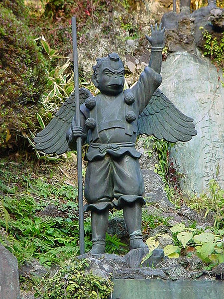 A statue of a Tengu dressed as an ascetic mystic on a mountain pilgrimage.  Source: Christian Bauer via Wikimedia.